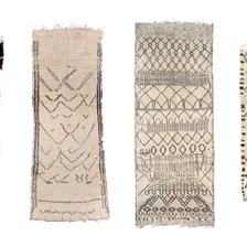 article on white ground Berber rugs from the Beni Ouarain and neighbouring tribes in the Middle Atlas, Morocco