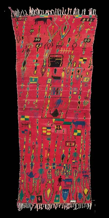 Vivid magenta Azilal rug filled with asymmetrical pictographic motifs