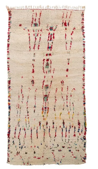 Ivory rug punctuated by vertical rows of fine red marks