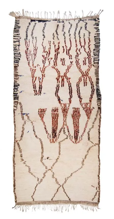 Ivory rug with elongated brown human-like figures and a diamond lattice