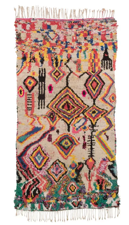 Polychrome Azilal rug filled with diamonds and improvised geometric motifs