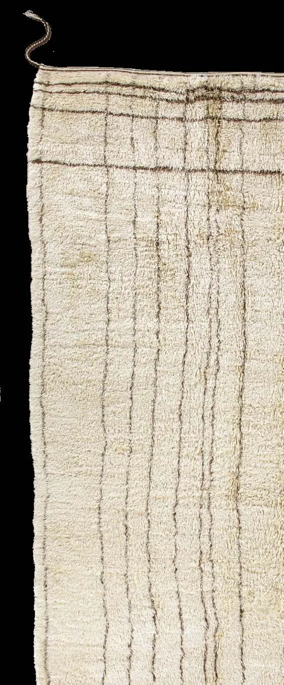 Long white pile rug with delicate vertical lines on a black background