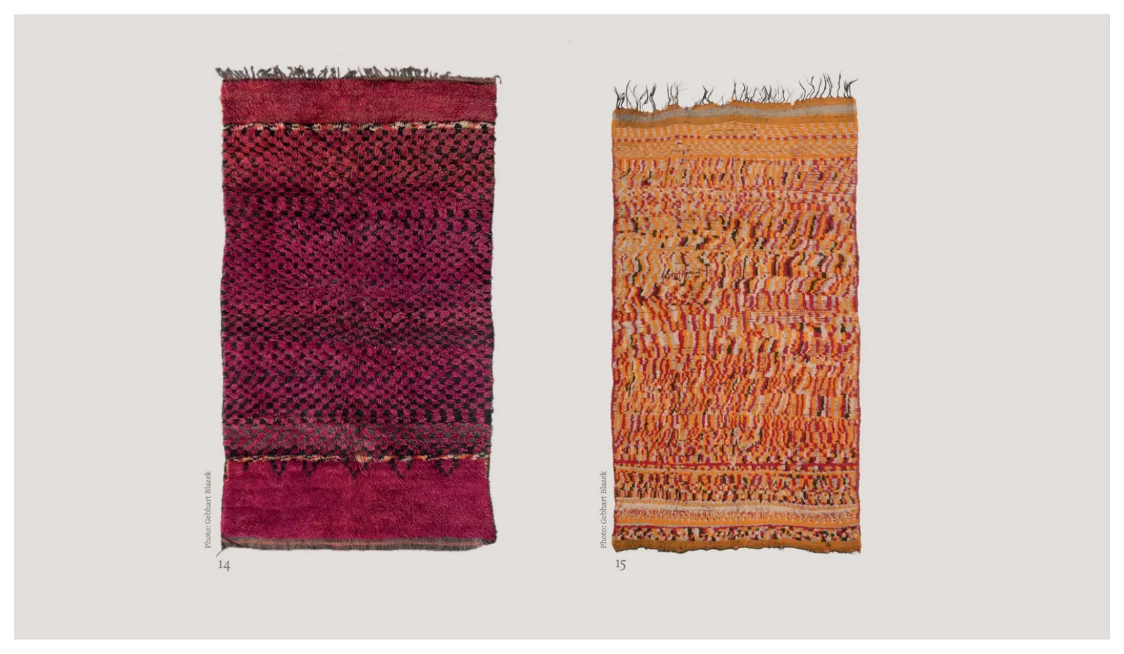Two small red and orange pile rugs with dense horizontal patterning