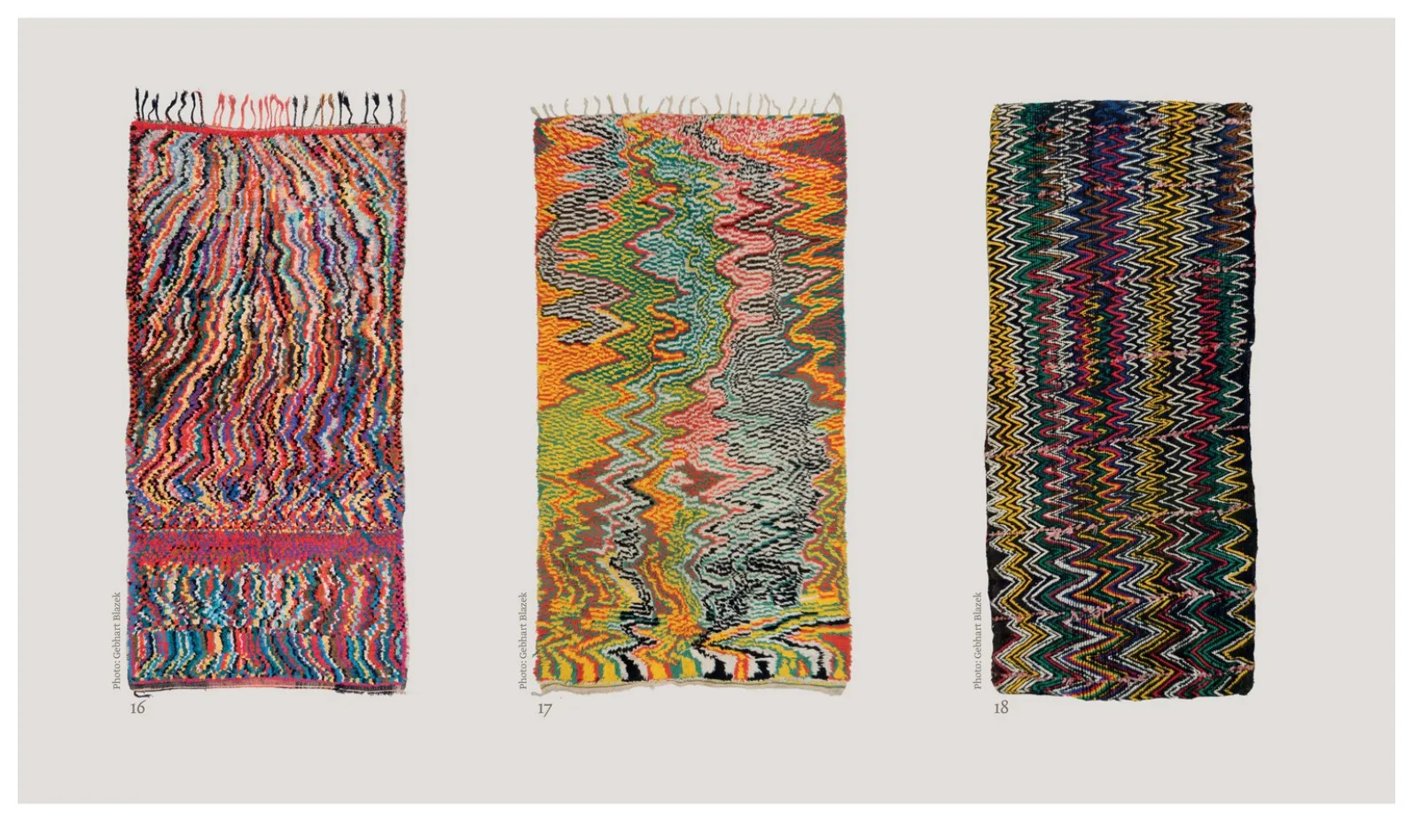 Three vibrant rugs built from multicoloured zigzag and striped bands
