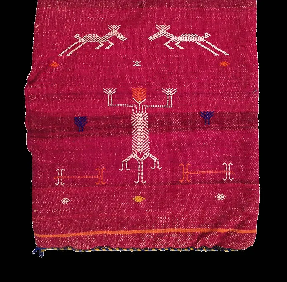 Magenta rug with paired white animals and a central branching motif