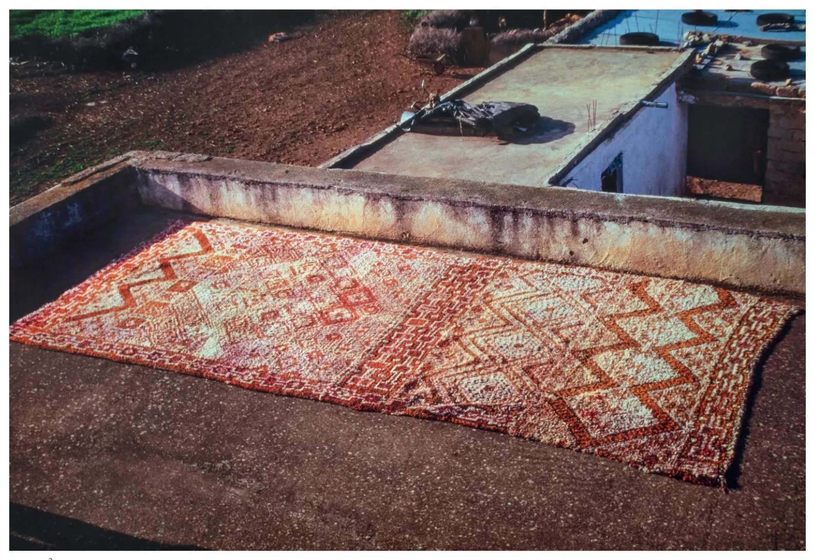 Beni Ouarain rug laid outdoors in Ain Fndel