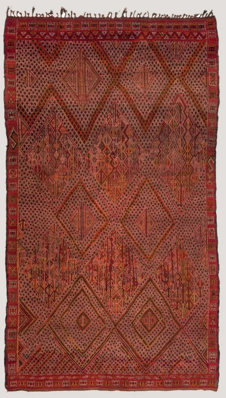 Back of the red Zayan rug showing its woven design