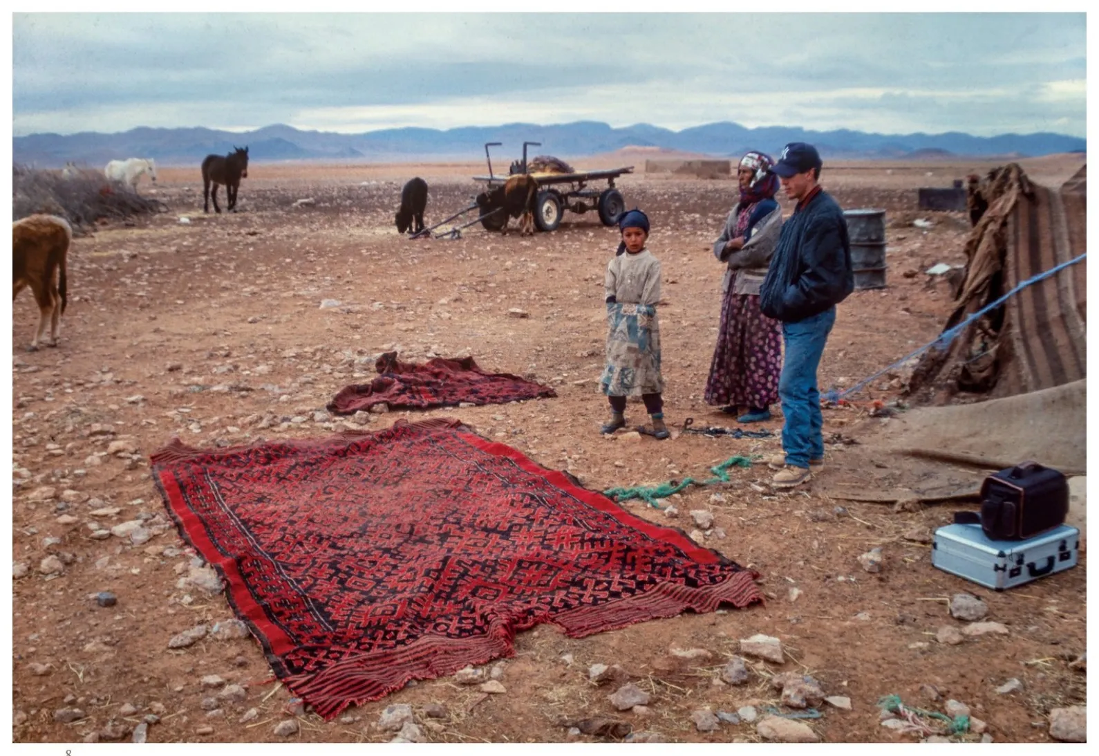 Nomadic settlement with a rug laid on the ground west of Ain Beni Mathar