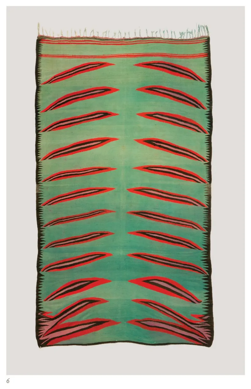 Green kilim animated by repeated red and black leaf-like forms