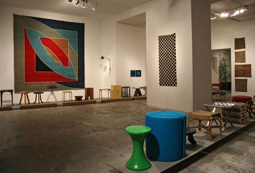 geometrien exhibition vienna. vintage Frank Stella carpet + Tibetan checkerboard rug